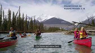 Paddlers on the Fraser River in British Columbia sing O Canada.