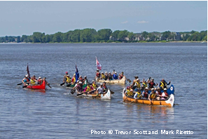 The Canadian Canoe Pilgrimage arriving in Montreal, Quebec. 
