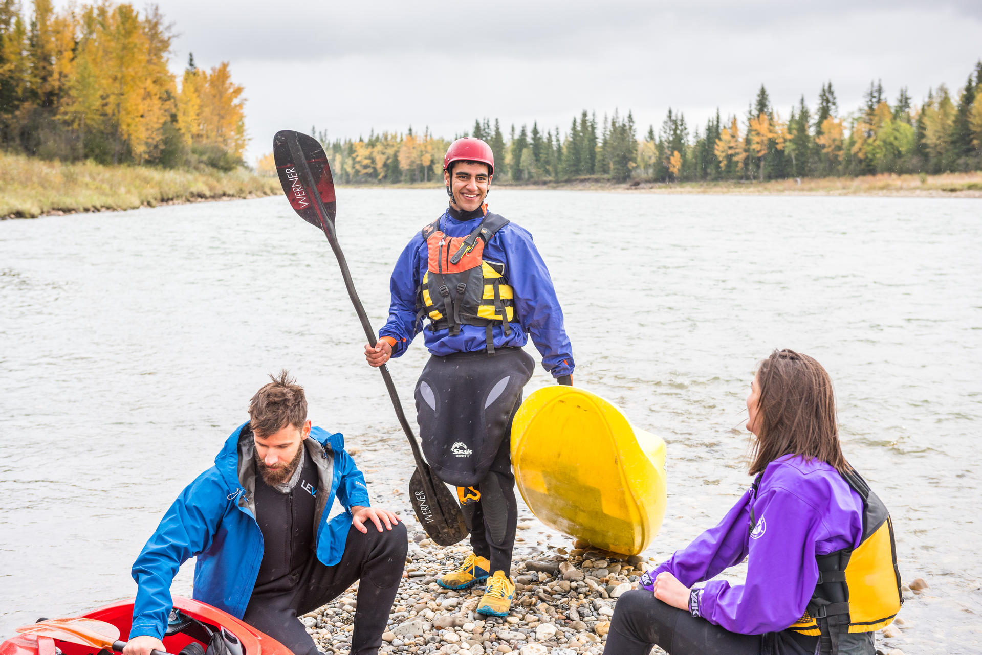 Three people kayaking on the North Saskatchewan River
