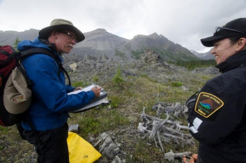 Park Planner, Brian Johnston, and Park Ranger, Alice McCulley, conducting an impact survey along the Bonnet Plume River 