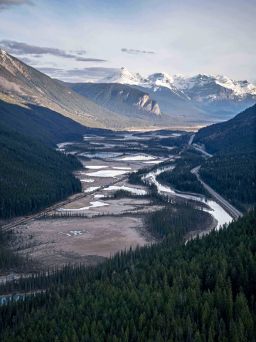 Aerial view of Ottertail Flats is seen between mountains.